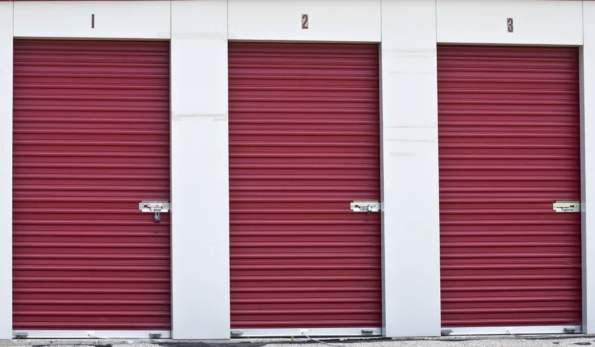 Red storage unit doors at Forest Creek Mini Storage
